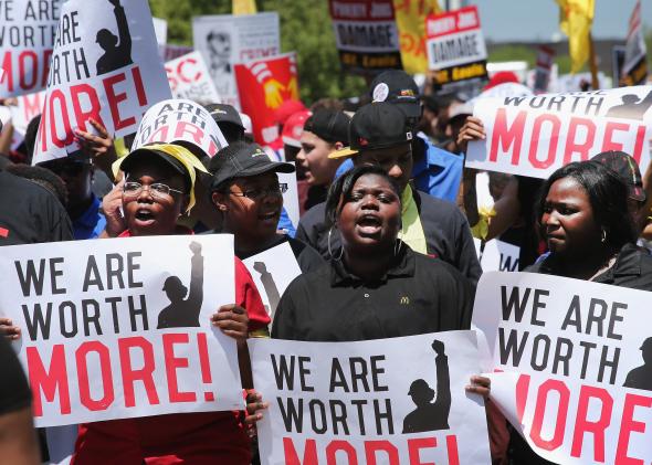 492723115-fast-food-workers-and-activists-demonstrate-outside-the 492723115-fast-food-workers-and-activists-demonstrate-outside-the