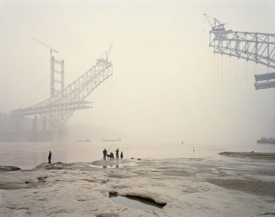 Photo of the Chaotianmen Bridge, the longest arched bridge in the world, under construction by Nadav Kander