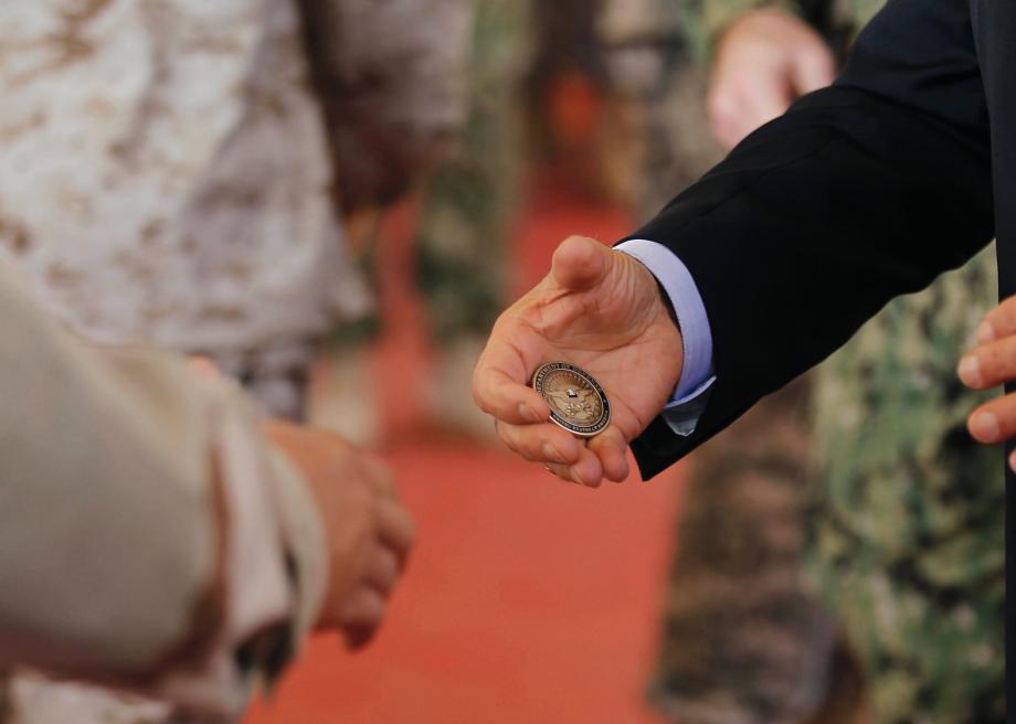 135718570-sec-of-defense-leon-panetta-hands-out-his-challenge 135718570-sec-of-defense-leon-panetta-hands-out-his-challenge