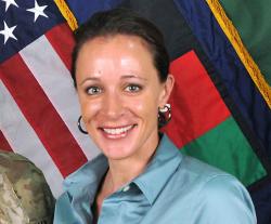 Gen. Davis Petraeus shakes hands with biographer Paula Broadwell.