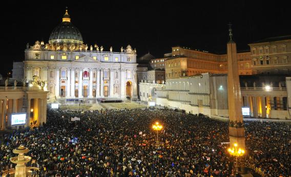 163611750 The crowd at St Peter's Square after white smoke billowed from the chimney of the Sistine Chapel announcing that Catholic Church cardinals had elected a new pope during a conclave on March 13, 2013, at the Vatican.