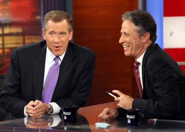 82637982-news-anchor-brian-williams-is-interviewed-by-host-jon