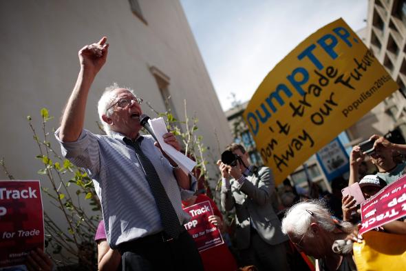 470456324-sen-bernie-sanders-speaks-to-protesters-taking-part-in 470456324-sen-bernie-sanders-speaks-to-protesters-taking-part-in