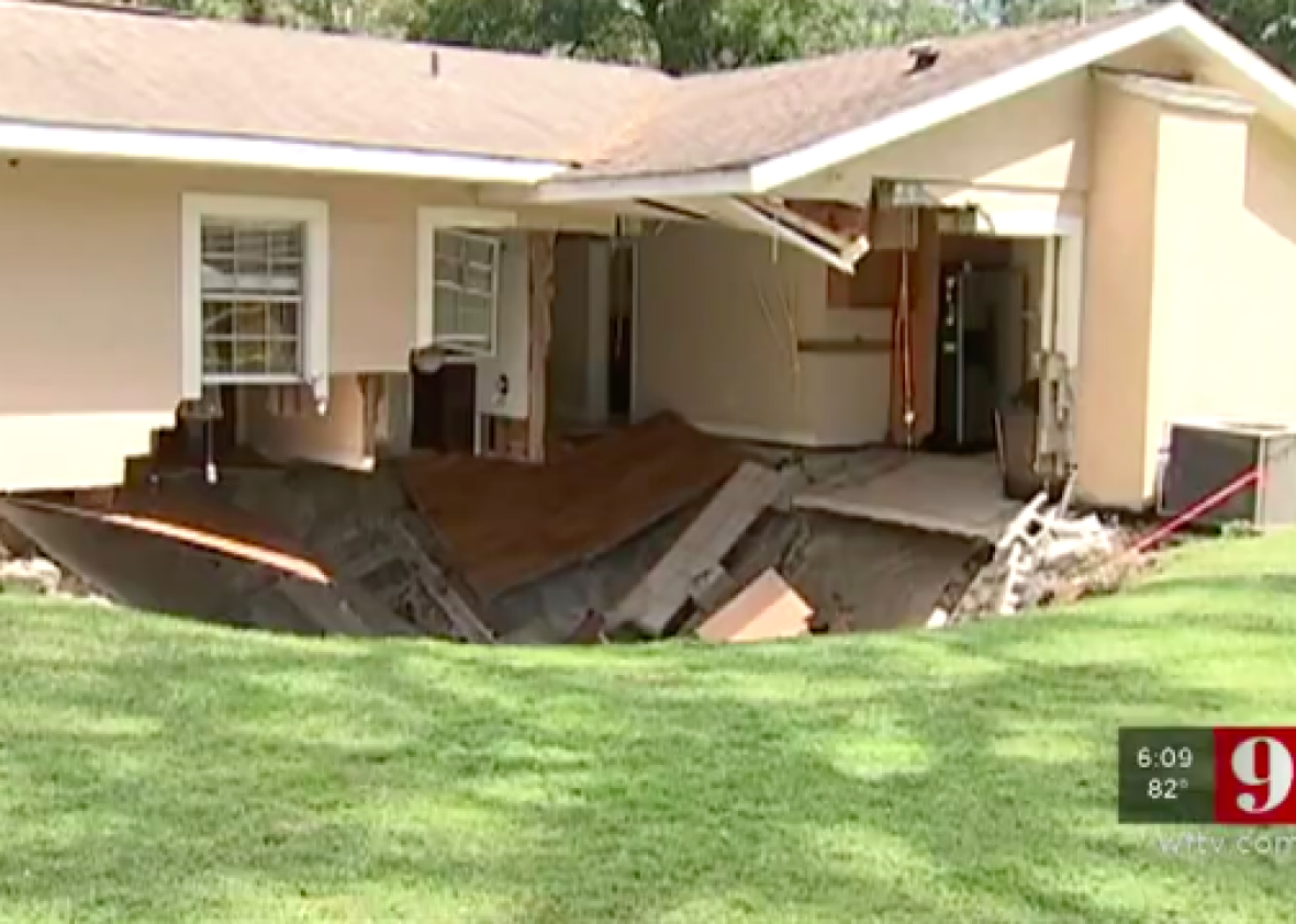 Massive sinkhole swallows part of home in Apopka, Florida.