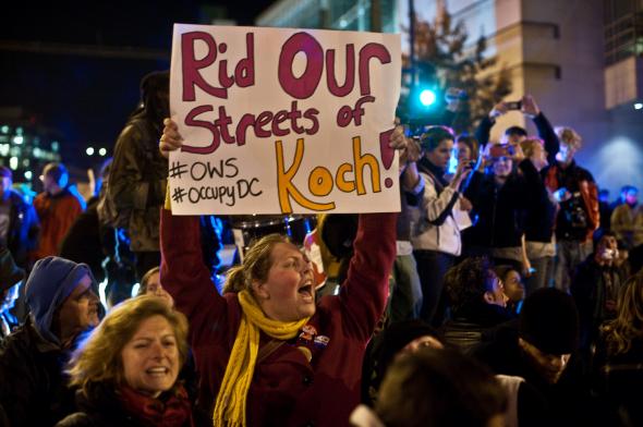 131464880-protesters-from-occupy-dc-block-a-street-in-front-of