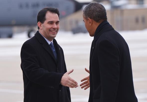 465889221-president-barack-obama-shakes-hands-with-wisconsin
