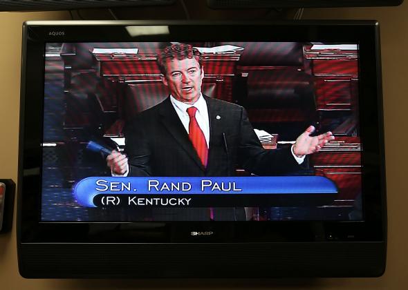 163275666-sen-rand-paul-is-seen-on-a-tv-monitor-as-he