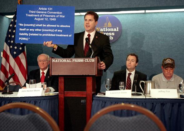 79213625-rep-bruce-braley-holds-up-a-copy-of-article-131-of-the