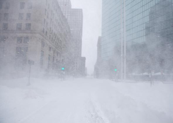 462368570-snow-swirls-in-white-out-conditions-during-a-blizzard